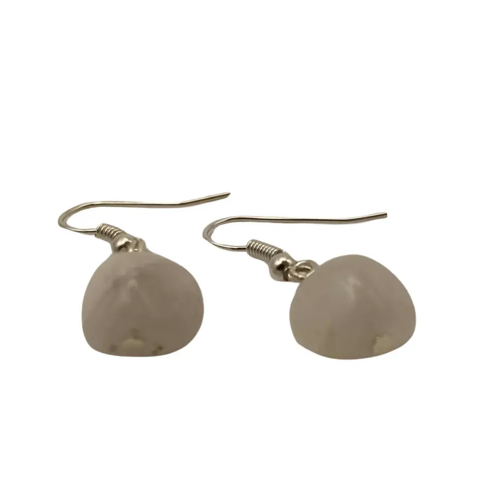 Delicate rose quartz earrings feature smooth translucent stones suspended from sleek silver fishhook clasps handcrafted earrings feature