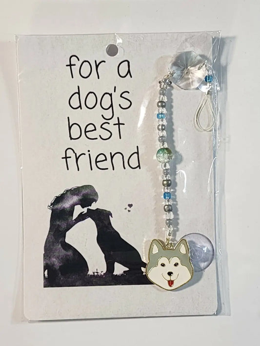 A charming silver and blue beaded small dog suncatcher with a smiling husky face pendant that suncatchers work best