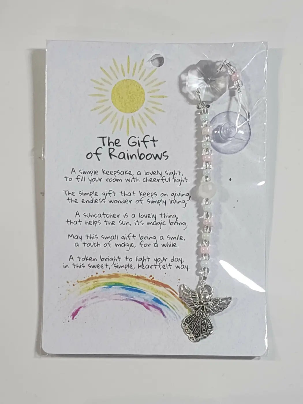 Small suncatcher silver angel shaped with clear crystal and pink pearl beads ideal for canadian made skincare spaces