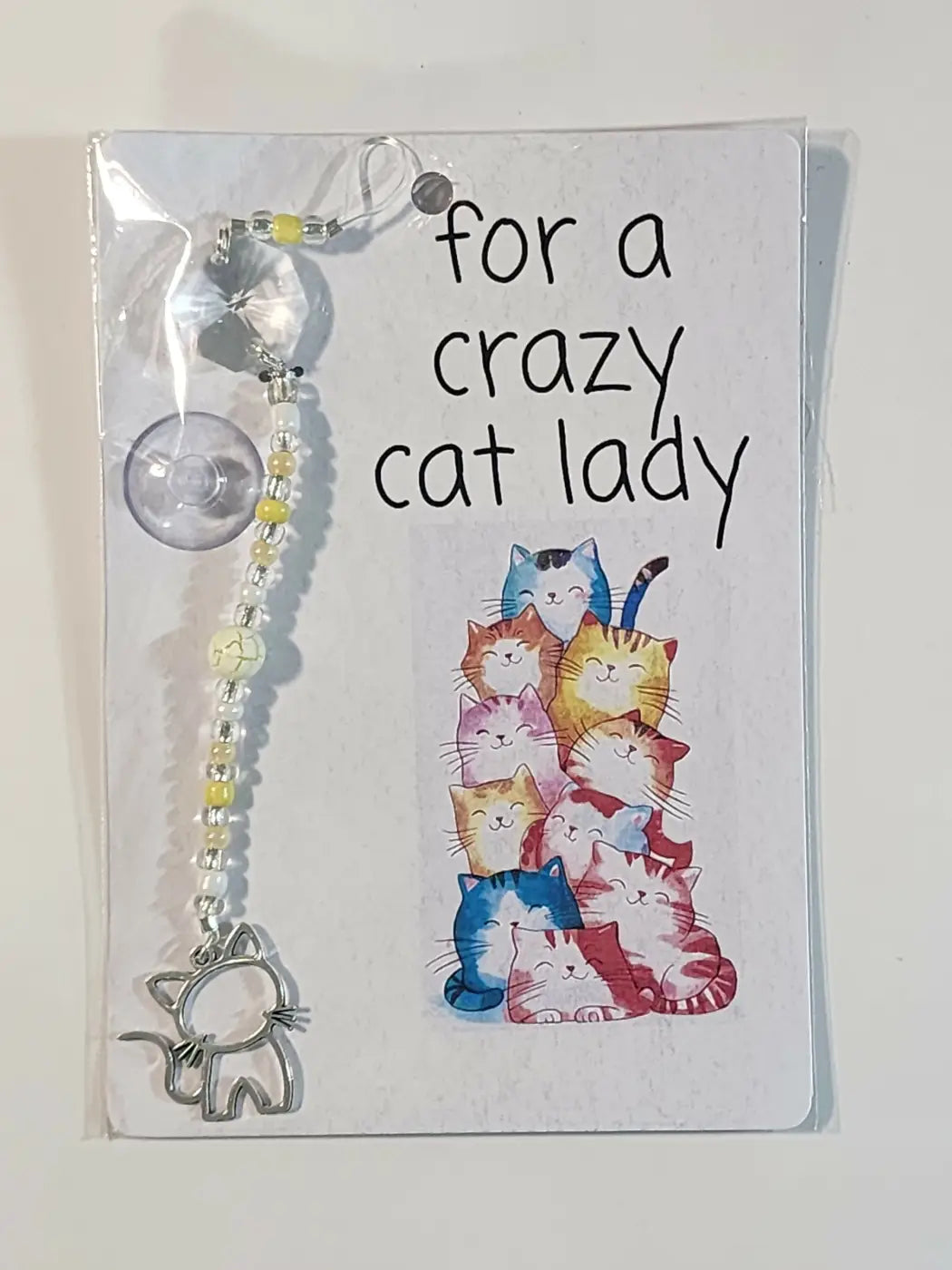 Small suncatcher clear beaded cat-themed car sunshade with suction cup and silver cat charm, ideal for canadian made skincare fans