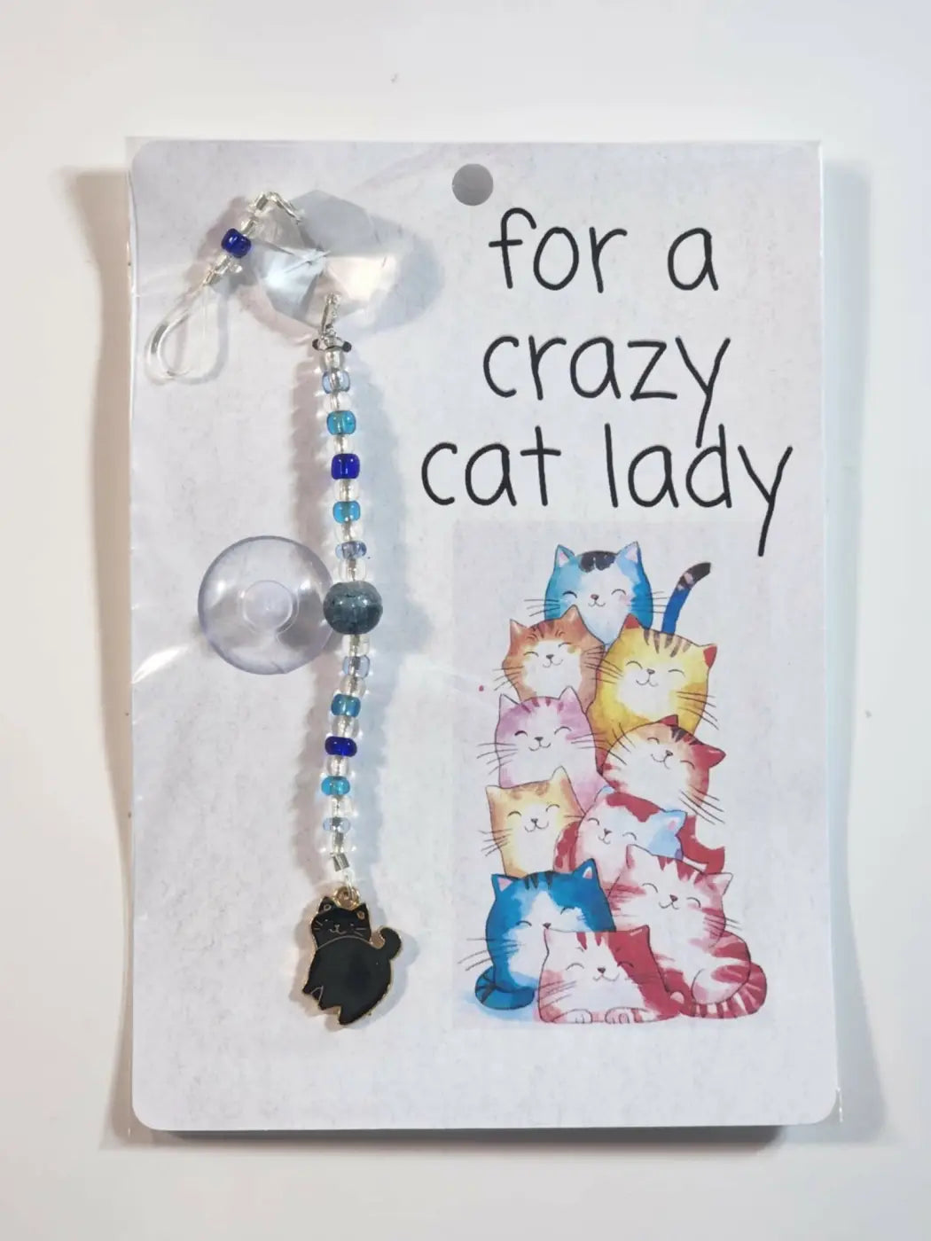 Small suncatcher clear beaded car sun visor charm with black cat pendant and blue accents, ideal for canadian made skincare fans