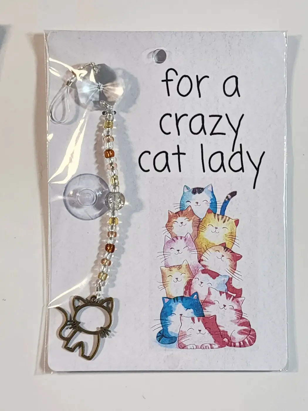 Small suncatcher clear beaded car window suction cup charm with silver cat silhouette and crystal top canadian made skincare accessory