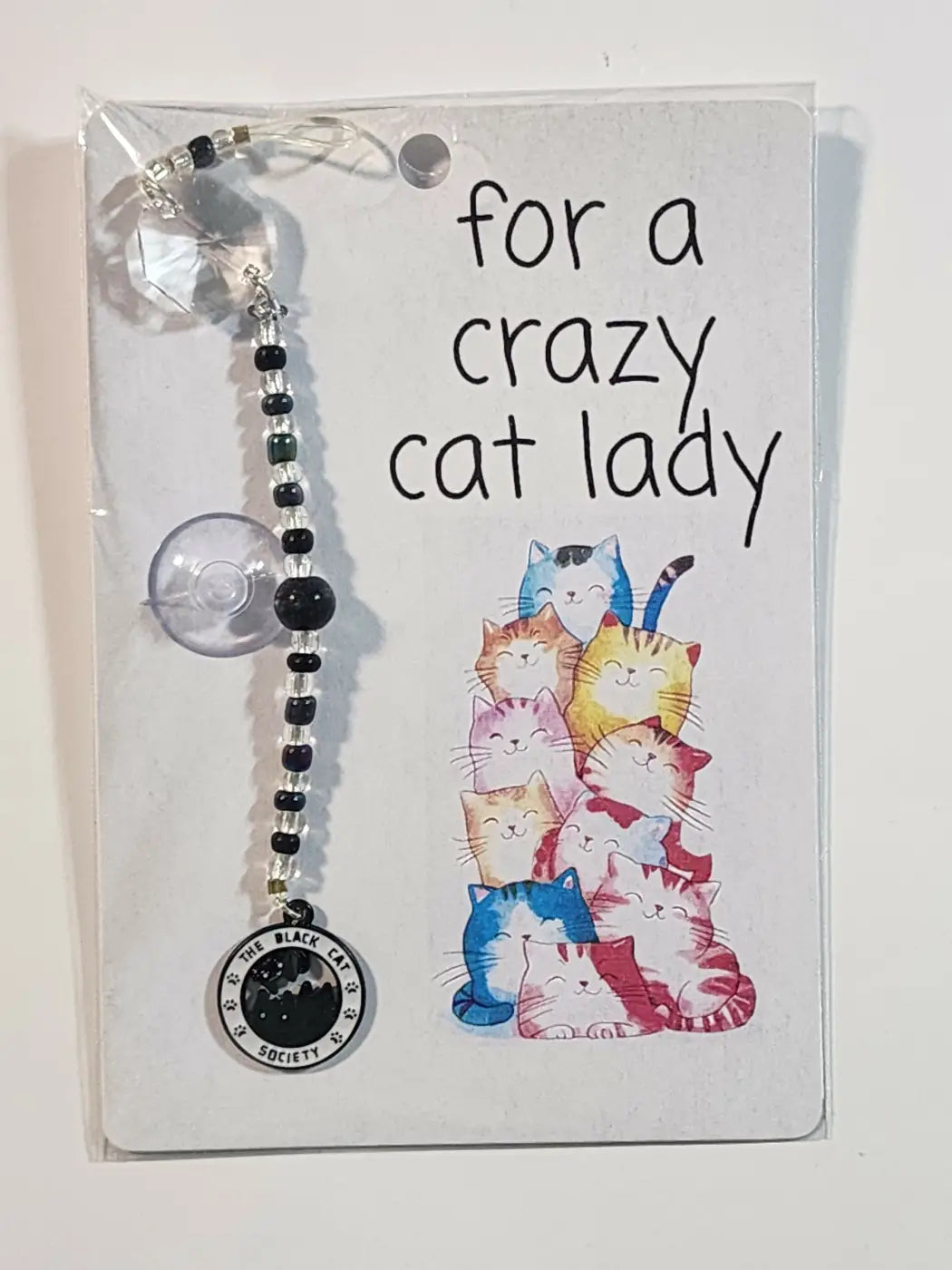 Small suncatcher car sun visor charm with black and silver beads, crystal top, and canadian made skincare pendant
