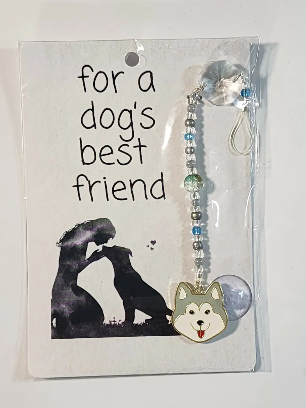 Small suncatcher silver and blue beaded phone charm with smiling husky face pendant supporting canadian made skincare