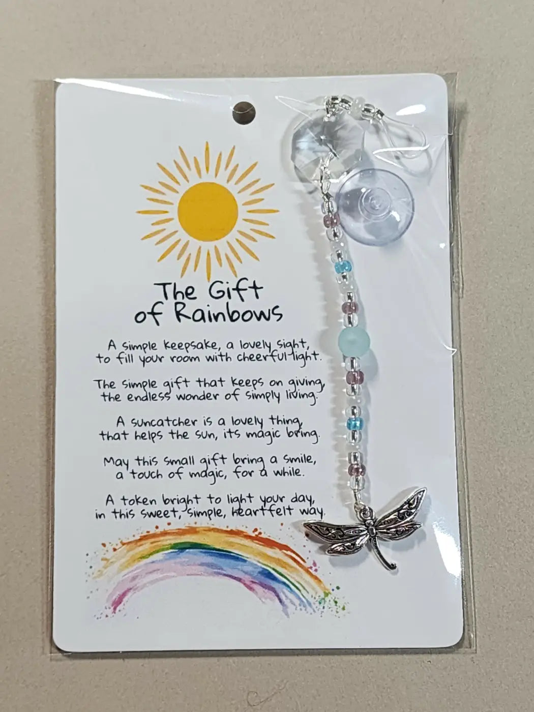 Small suncatcher silver dragonfly with clear and multicolored beads and suction cup for canadian made skincare decor