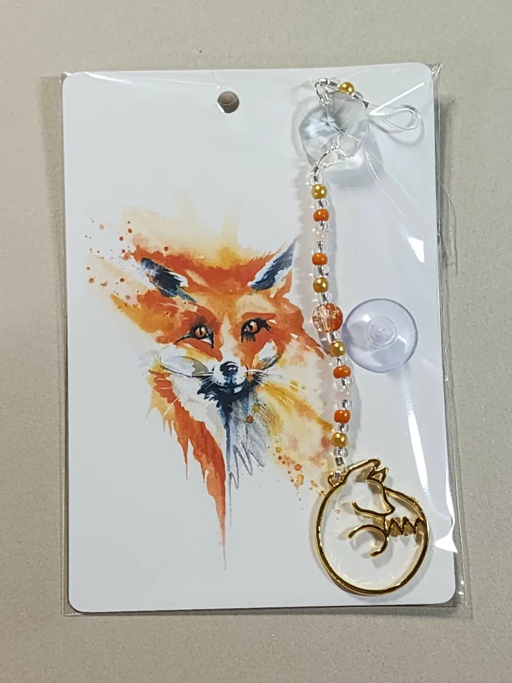 Small suncatcher gold-toned fox keychain with orange and clear beads on suction cup for car use canadian made skincare accessory