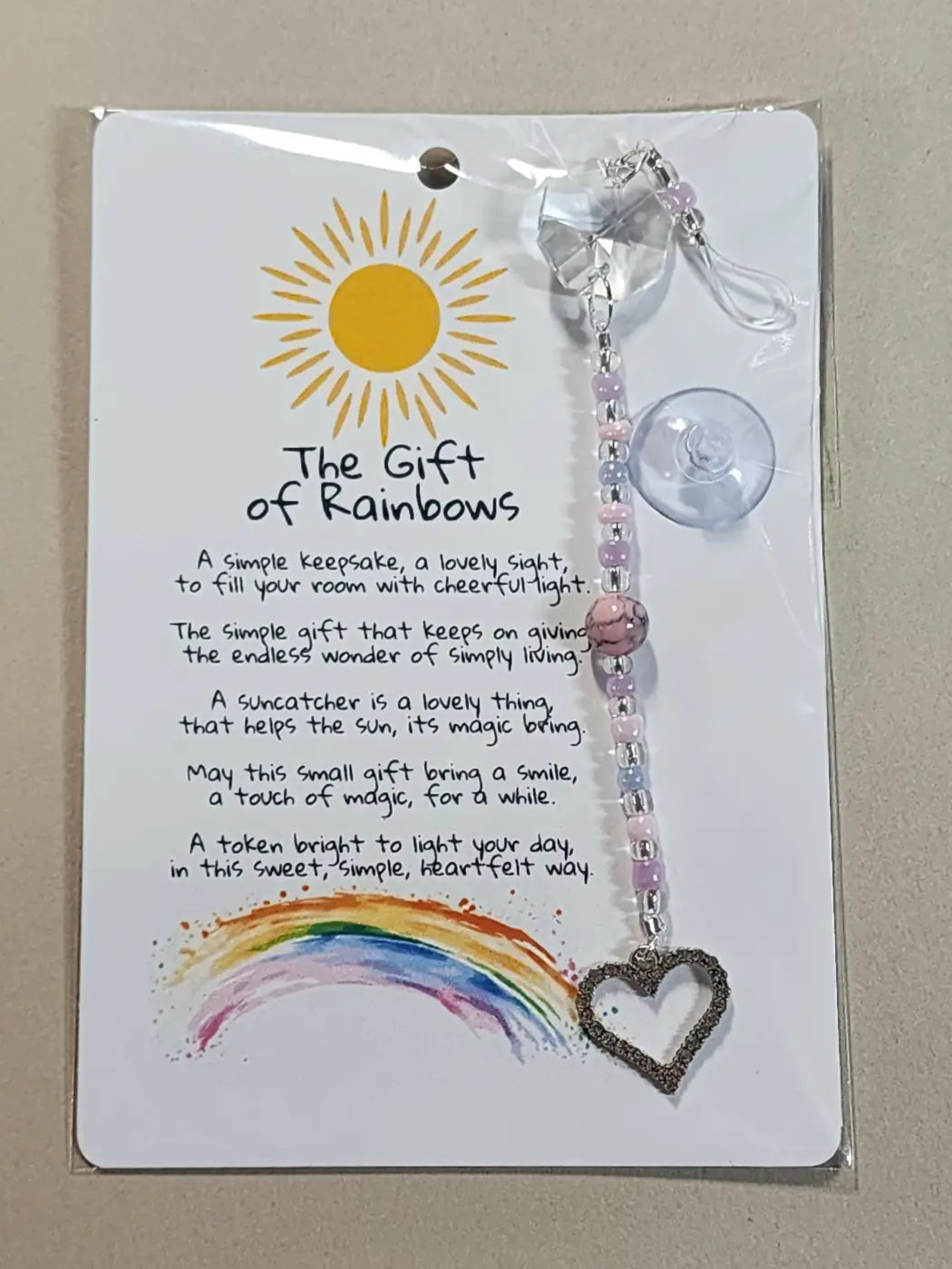 Small suncatcher with delicate pink and silver beads, crystal top, dark heart charm, ideal for canadian made skincare decor