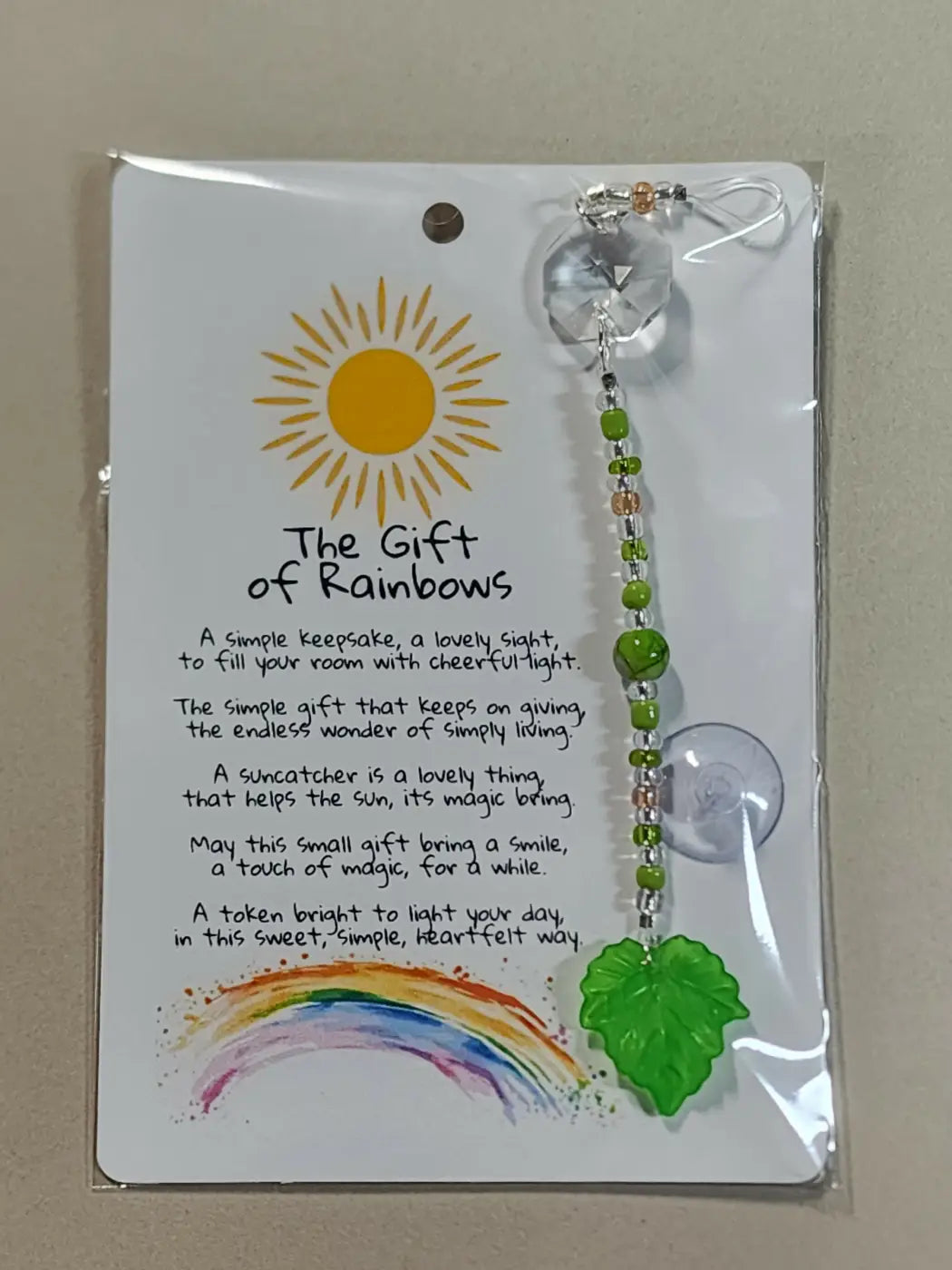 Small suncatcher green leaf shaped with clear crystal top and green beads ideal for canadian made skincare decor