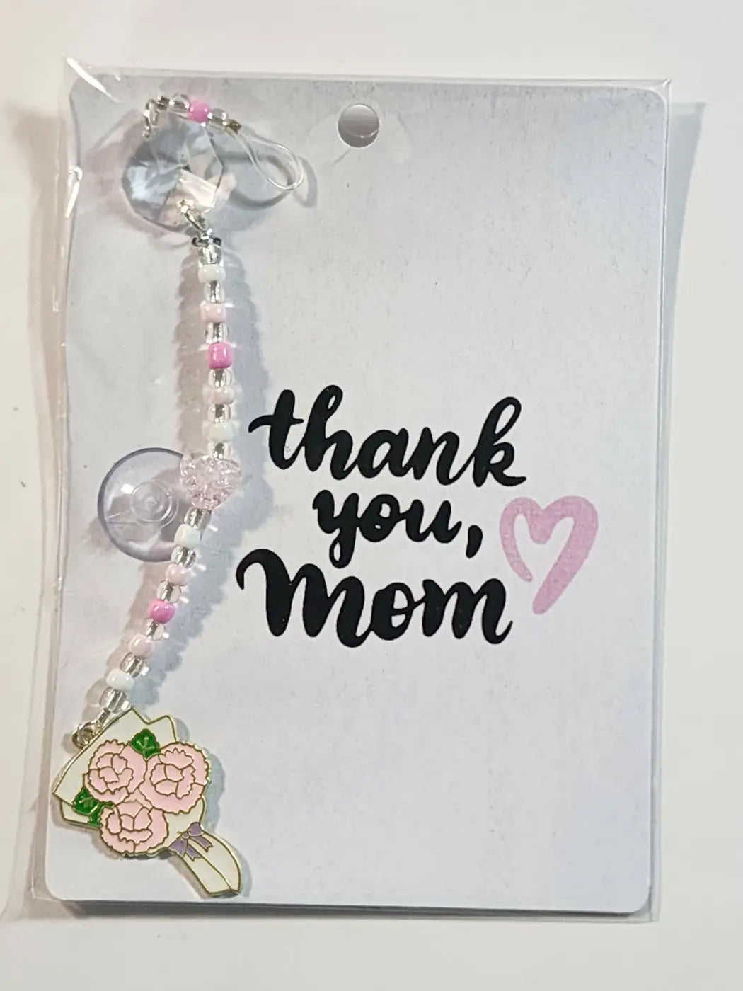 Small suncatcher delicate pink and clear beaded carabiner charm with floral design and suction cup for canadian made skincare display