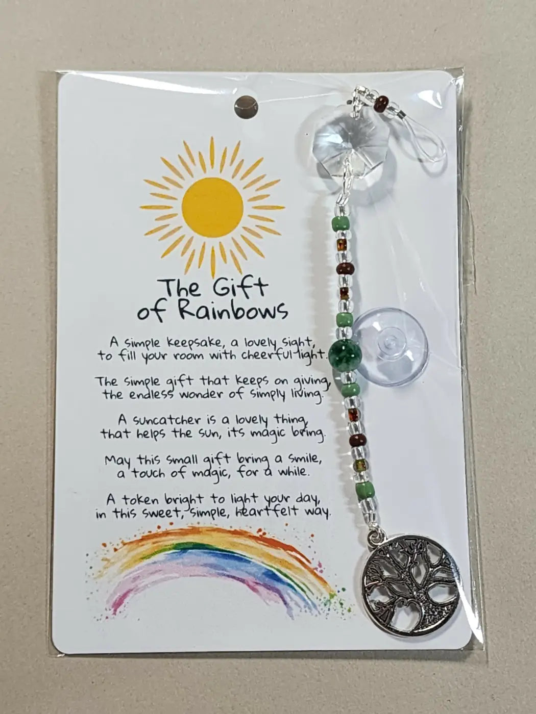 Small suncatcher silver tree of life with clear crystal top and green brown beaded chain ideal for natural skincare Canada decor