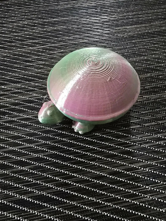 Small turtle 3d-printed figurine with pastel pink and mint green layered glossy shell handmade soap Canada decor