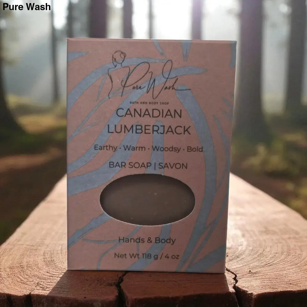 Canadian Lumberjack bar soap packaging on a wooden surface with a forest background