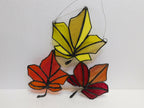 stained glass fall colored leaves. This grouping of 3 , couldn't say its Fall louder. at 8 1/2 x8 in it brings warmth to any window - Pure Wash Canadian Made - Winnipeg