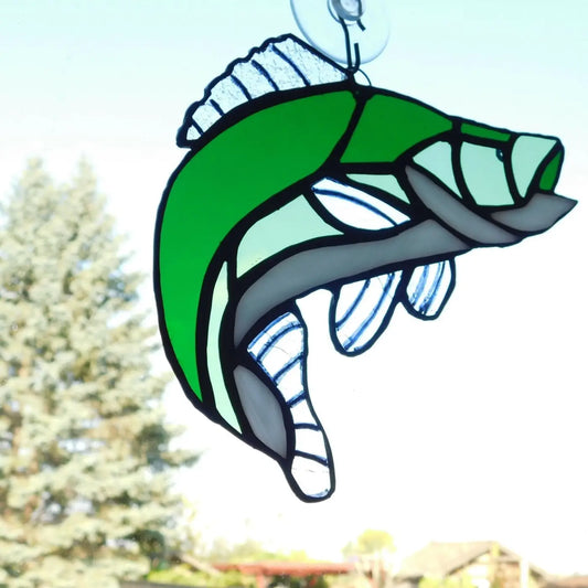 A vibrant green and gray stained glass fish ornament featuring intricate handmade fish art and glass trout design