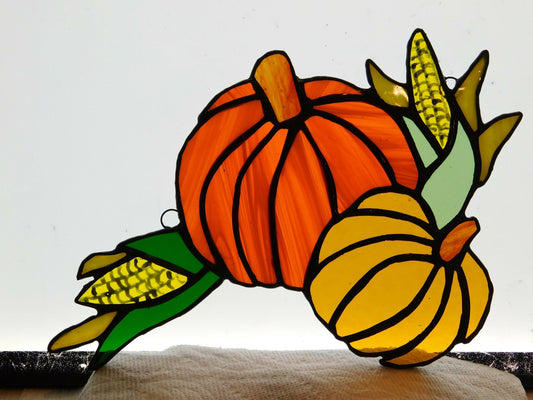 stained glass suncatcher - displays traditional fall vegetation, highlighted by the bright orange pumpkin w hand painted corn stocks, a full 10in x 6 in - Pure Wash Canadian Made - Winnipeg