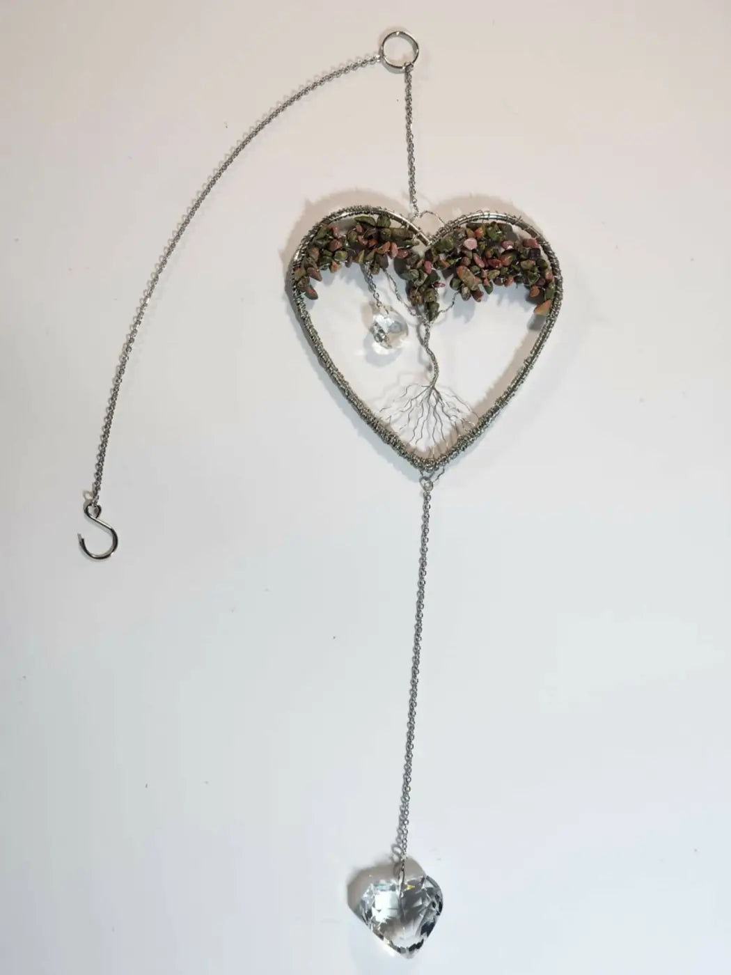 Tree of Life Heart stone suncatcher, a wire-wrapped heart hoop with green and pink stones
