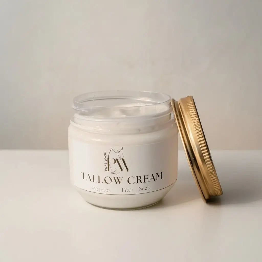 A white glass jar with gold lid containing tallow cream enriched with pure wash tallow and avocado oil for face and neck