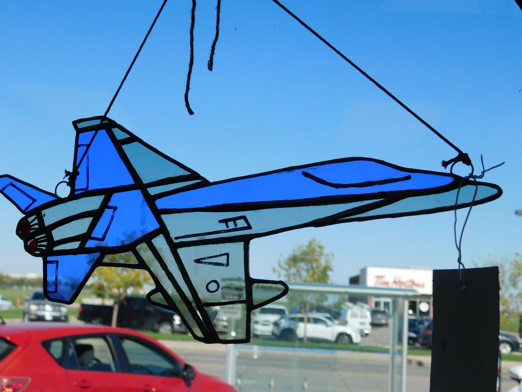 the second, cf - 18 fighter jet , same size 11L x 7 w , but blue & grey I loved making these, hand painted details, together, this & the gray one looks ideal - Pure Wash Canadian Made - Winnipeg