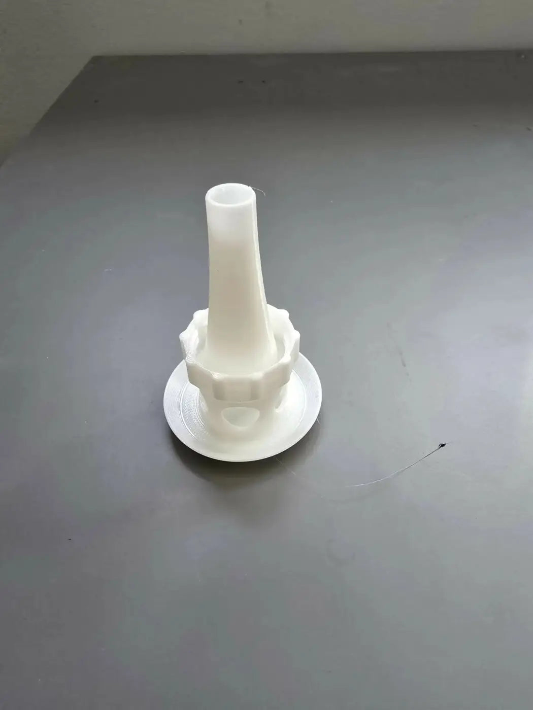 White plastic faucet aerator with flared base and threaded neck for wasp trap by pure wash handmade soap canada