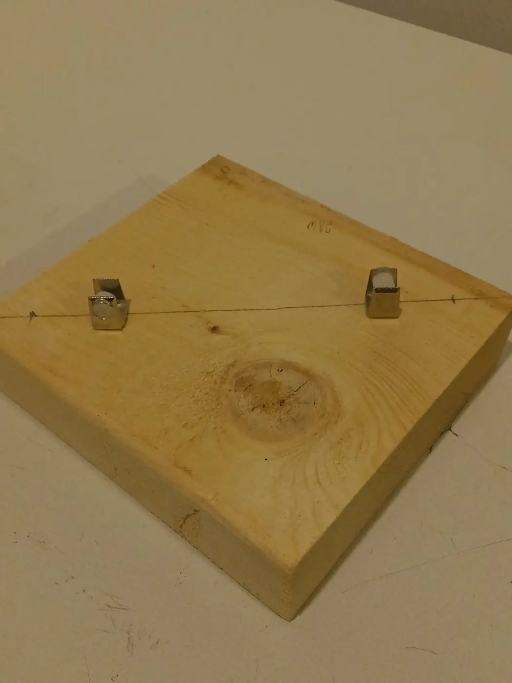 Square wooden stained glass stand with adjustable metallic fasteners on 6in x 6in board for stained glass suncatcher