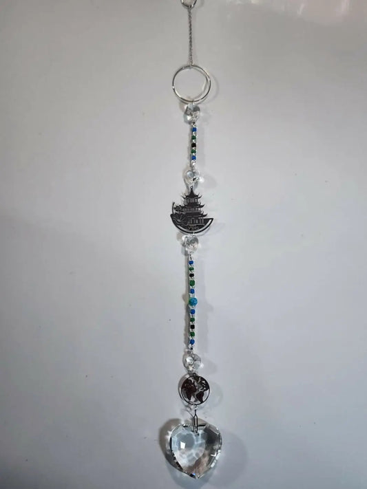 World long suncatcher with silver-toned metal, dangling heart crystal, blue beads, pagoda charm iridescent ornament