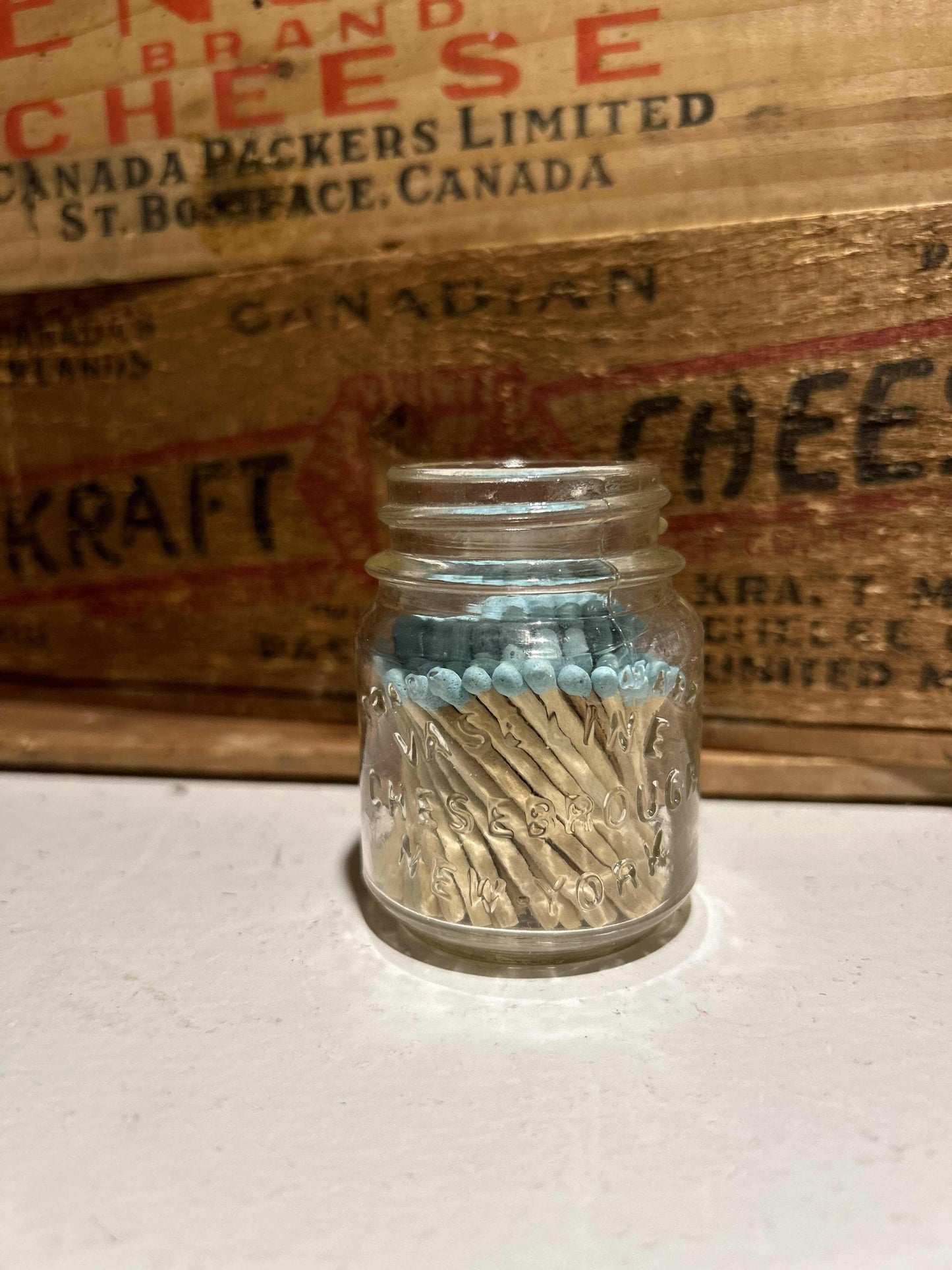 Small Antique Vaseline JarMatch VesselSmall Antique Vaseline Jar mudlarked from one of the rivers in Manitoba, now repurposed as a match vessel! Filled with colored matches made of aspen wood, hand craftSmall Antique Vaseline JarCG Pure Wash