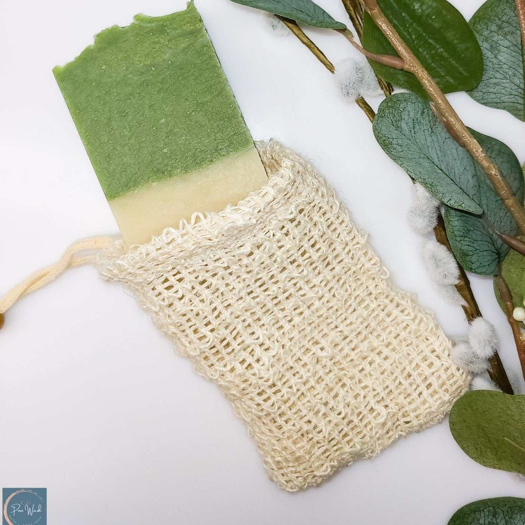 Eco-friendly soap saver bag with green soap bar.