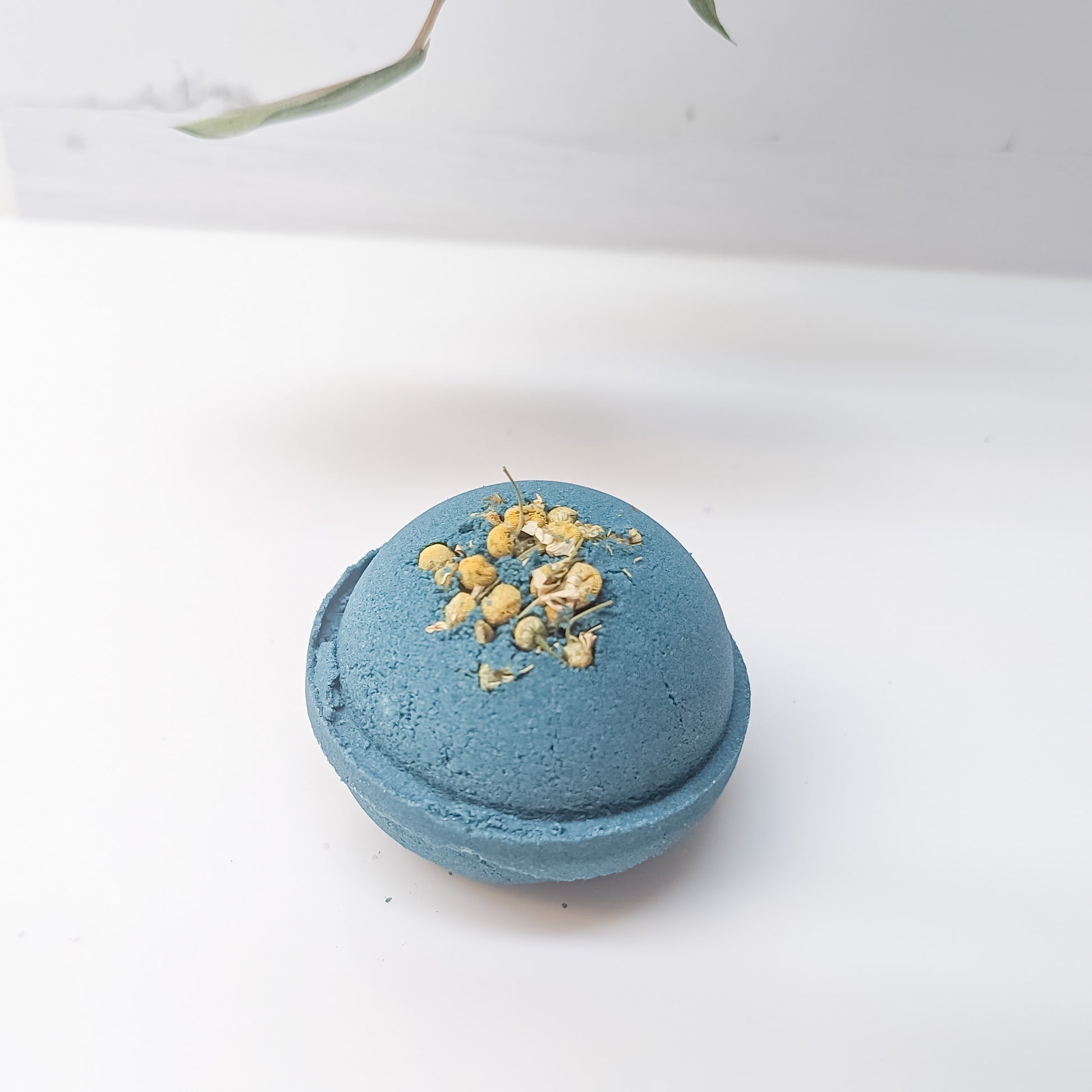 Our Blue Chamomile Bath Bomb, a symbol of CG Pure Wash's dedication to creating all-natural, relaxing and nourishing bath experiences | CG Pure Wash