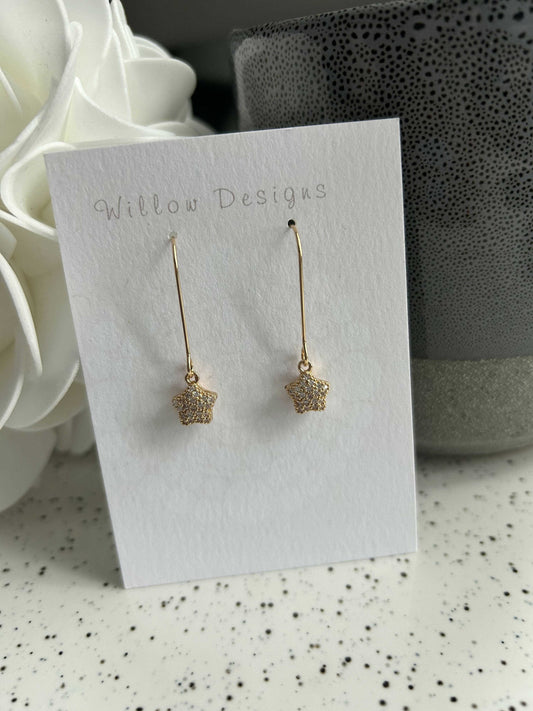 Dropped Hook Gold Glittery Star Dangly EarringsJewelryPlayful glittery star earrings!-14K gold plated-hypoallergenic -nickel freeDropped Hook Gold Glittery Star Dangly EarringsCG Pure Wash