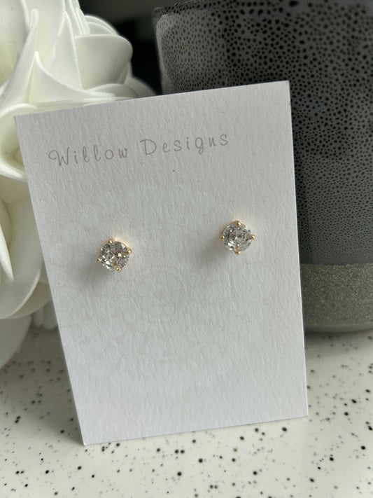 Classic Circle Cubic Zirconia Gold StudJewelryThese studs are so classy. They sparkle and shine in the light. -Posts are 14K gold plated-hypoallergenic-nickel free Classic Circle Cubic Zirconia Gold StudCG Pure Wash