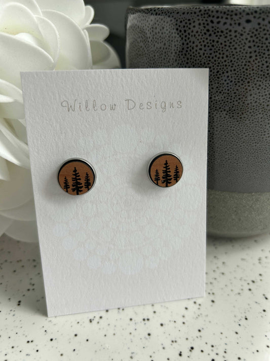 Wooden Tree Druzy StudsJewelryThese wooden studs are made of cherry wood and have engraved trees on them. They measure 12mm. The studs are made of stainless steel which is hypoallergenic and nickWooden Tree Druzy StudsCG Pure Wash