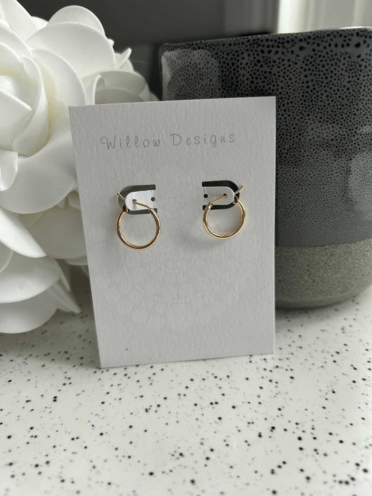 15mm Small Gold HoopEarringsThese pretty hoops are 14K gold plated. They are hypoallergenic and nickel free.15mm Small Gold HoopCG Pure Wash